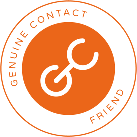Genuine Contact Friend membership badge. The badge is a circle with an outer ring that has the words "Genuine Contact Friend" in orange text on a white background and an inner circle with the Genuine Contact logo in it. The logo is a stylized letter G and C together on an orange background.