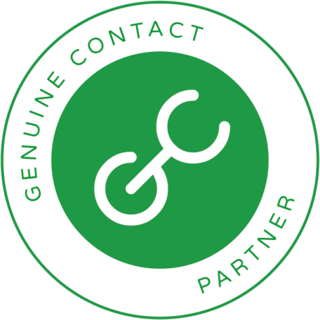 Genuine Contact Partner membership badge. The badge is a circle with an outer ring that has the words "Genuine Contact Partner" in green text on a white background and an inner circle with the Genuine Contact logo in it. The logo is a stylized letter G and C together on a green background.