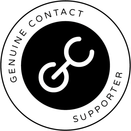 Genuine Contact Supporter membership badge. The badge is a circle with an outer ring that has the words "Genuine Contact Supporter" in black text on a white background and an inner circle with the Genuine Contact logo in it. The logo is a stylized letter G and C together on a black background.