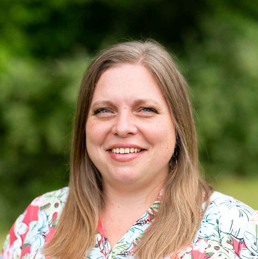 Photo of Rachel Bolton outdoors with greenery in the background. Rachel is the Director of Genuine Contact and a Senior Consultant at Dalar International Consultancy.